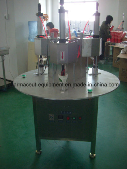 Two Sealing Heads Tea Hidden Cup Sealing Processing Packing Machine in China