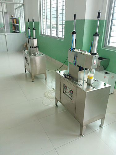Manual Model Filling Tea Cup Hidden Filling Packing Machine (Double Heads)