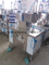 Two Sealing Heads Tea Hidden Cup Sealing Processing Packing Machine in China